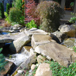 Rock waterfall in the front of the house